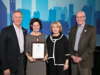 Tina Roberts, LSW, St. Luke're Regional Cancer Center Accepting Award